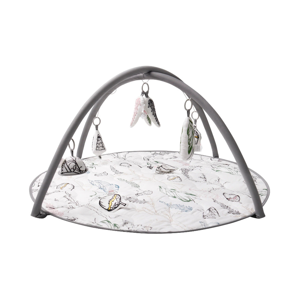 Nest Designs Bamboo Baby Play Mat & Activity Gym Fresh Forest with gray arch and four hanging plush toys