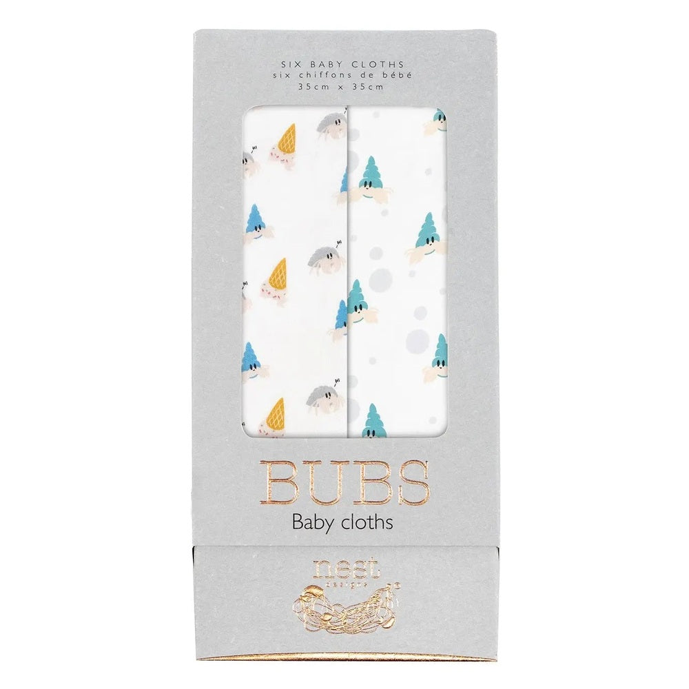 Nest Designs Bamboo Bubs Baby Washcloth Set (6-Pack): white cloths with teal trees pattern folded in the package.