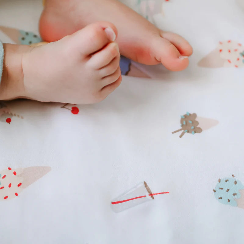 Nest Designs bamboo crib sheet Ice Cream Summer featuring pastel ice cream cone pattern on white
