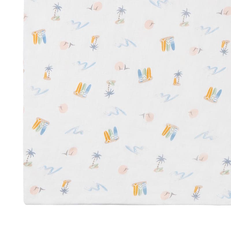 Nest Designs Bamboo Crib Sheet pastel waves on white with palm trees and surfboards