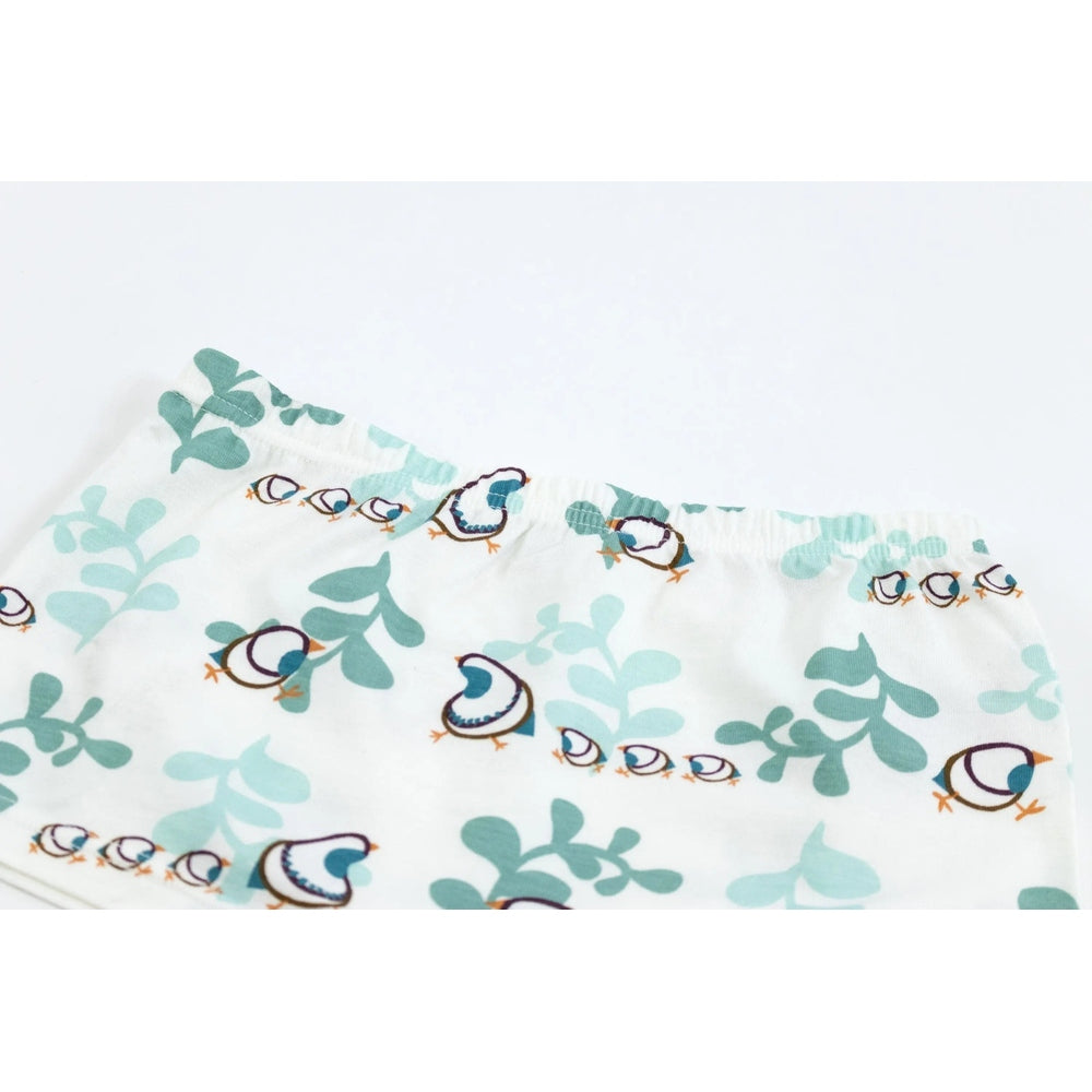 Nest Designs bamboo girls' boy short underwear 2-pack, teal quail print on white fabric shown folded.