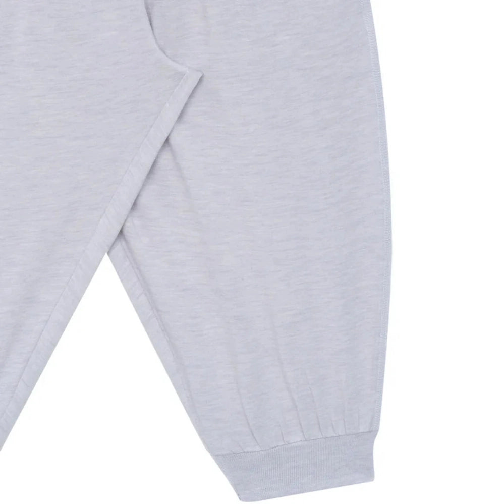 Nest Designs Bamboo Jersey Harem Pants Lavender Blue laid flat, showcasing soft fabric and elastic cuffs.