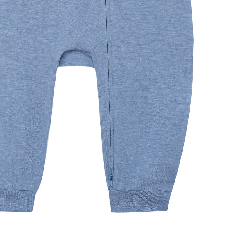 Nest Designs bamboo jersey romper Troposphere blue with a visible slant zipper opening along the leg for easy diaper changes.