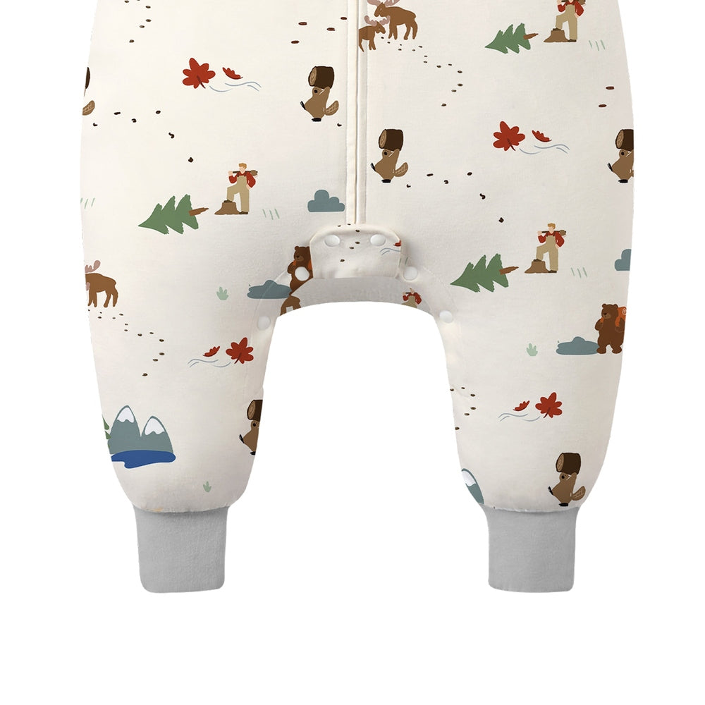 Nest Designs bamboo long-sleeve footed sleep bag in Timber, cream with woodland bears, shown with front zipper and soft cuffed ankles.