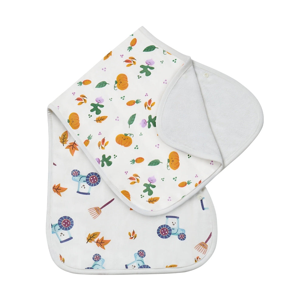 Nest Designs bamboo muslin Burp N Bib 2-pack Harvest Time with pumpkin and leaf print on white