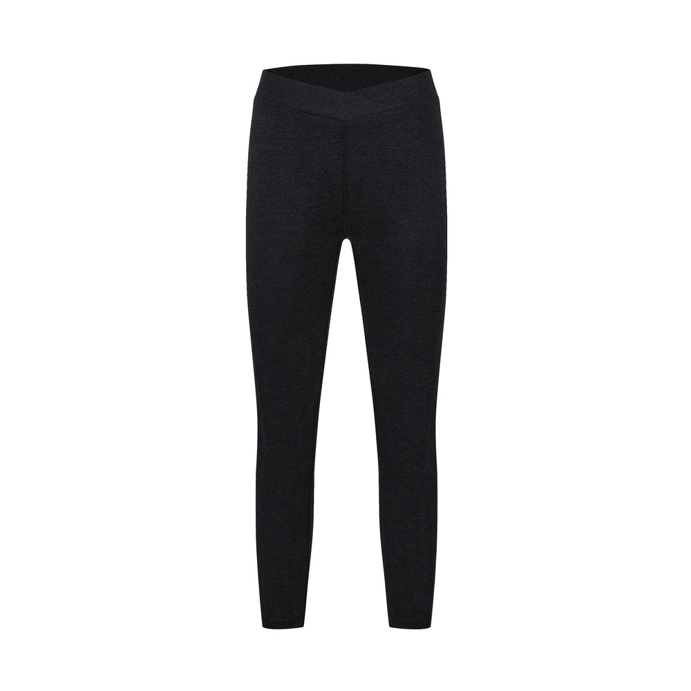 Solid black bamboo maternity leggings with wide crisscross waistband.