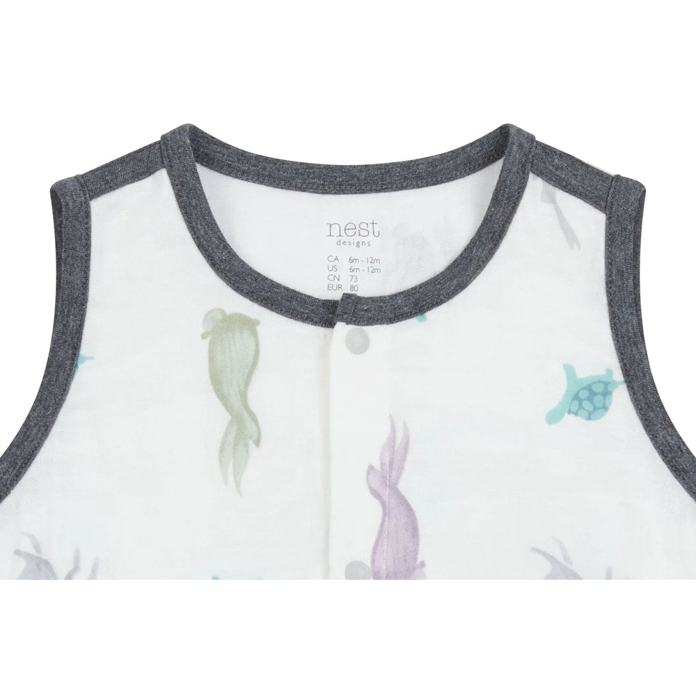 Nest Designs Bamboo Pima Sleeveless Onesie The Tortoise & The Hare, white with charcoal trim, showing turtle prints