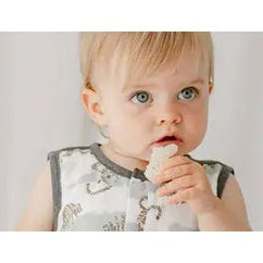 Nest Designs Bamboo Pima Sleeveless Button Down Onesie Jungle Stripes; a baby wears the breathable sleeveless onesie, showing jungle stripes.