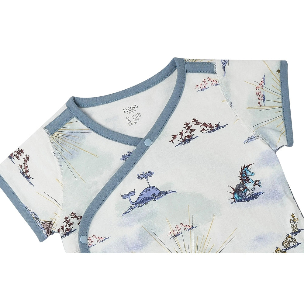 Nest Designs Bamboo Short Sleeve Kimono Onesie Ocean Wonders in light blue trim, wrap-front snaps clearly shown