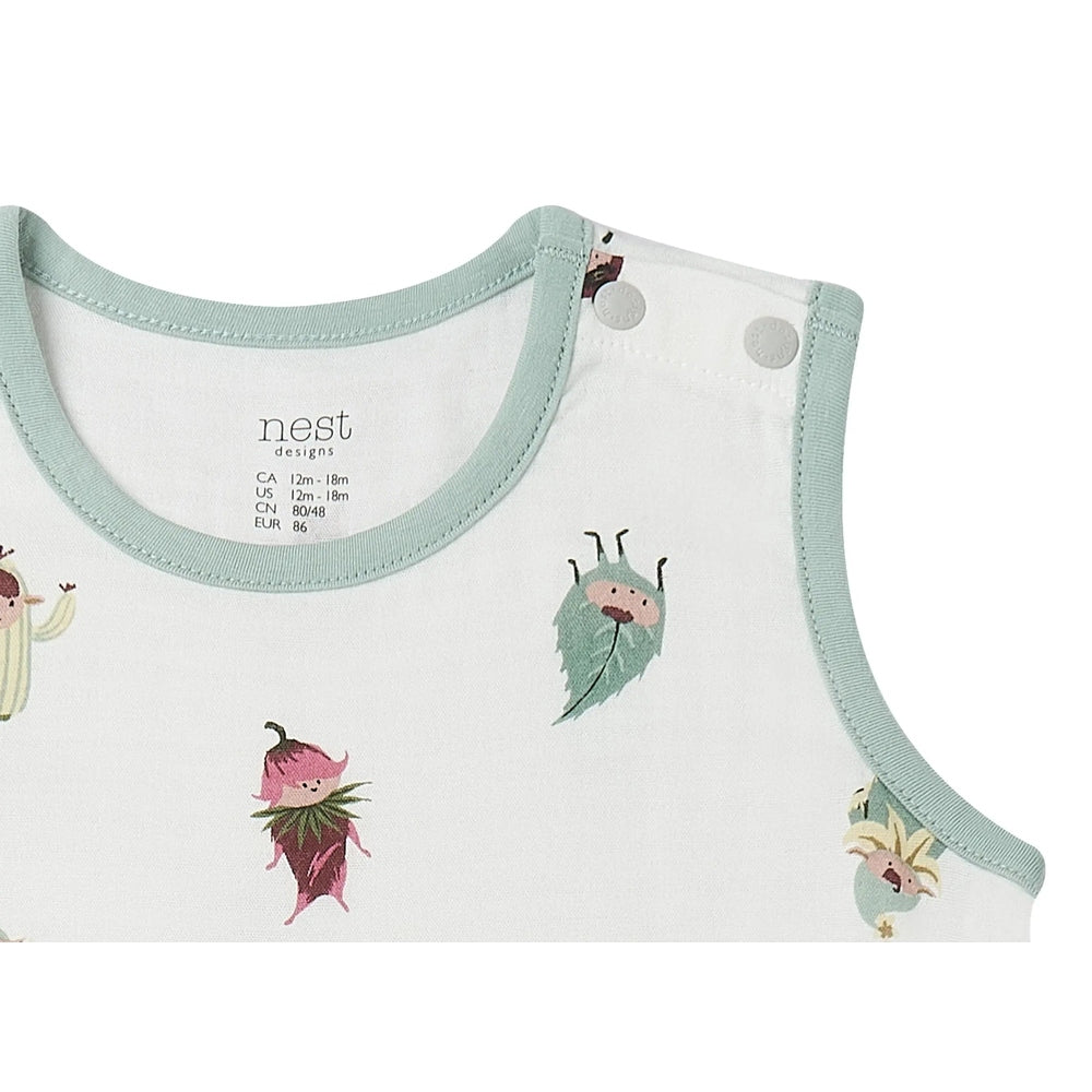 Nest Designs Bamboo Sleeveless Romper Pixie Dust with mint trim, showing shoulder snaps and cute fairy print.