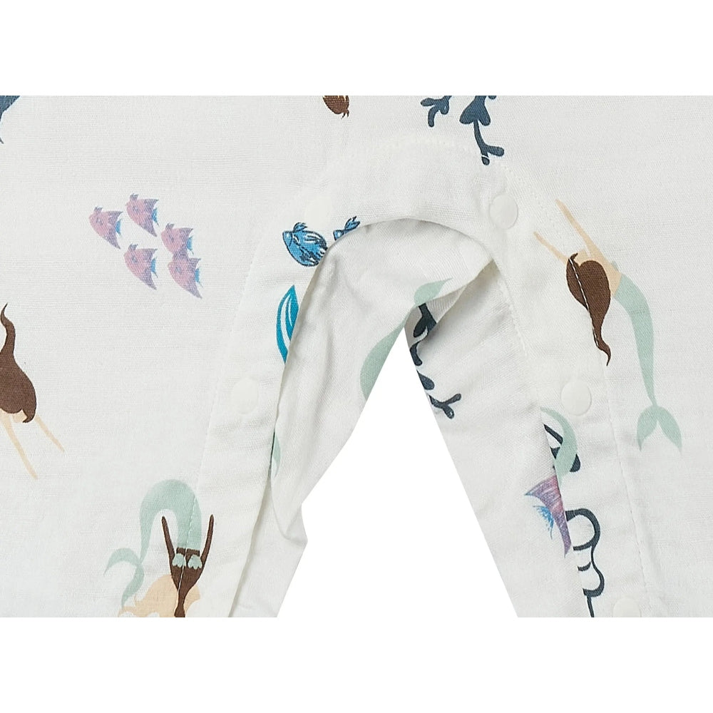 Nest Designs Bamboo Sleeveless Romper Splish Splash, white with pastel sea-life print, showing front snap buttons.