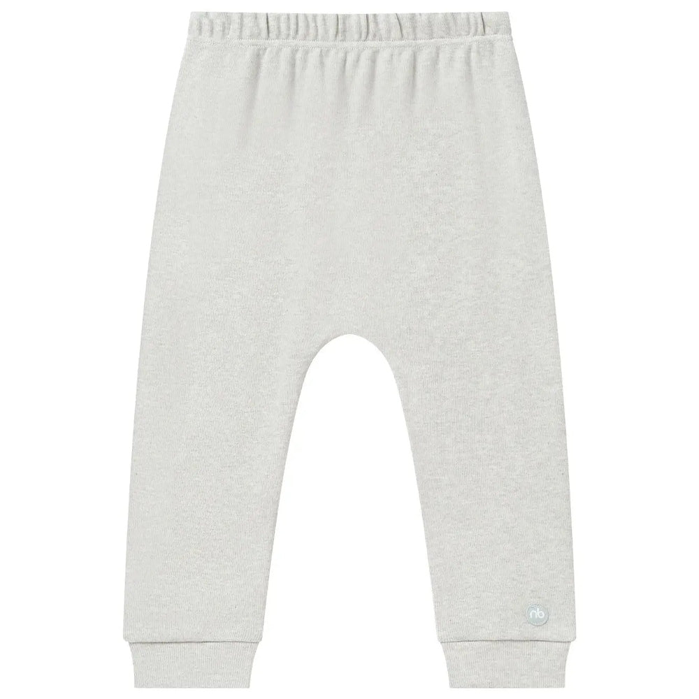 Nest Designs Basics Organic Cotton baby sleep pants in light grey, laid flat to show soft knit fabric and ribbed cuffs.