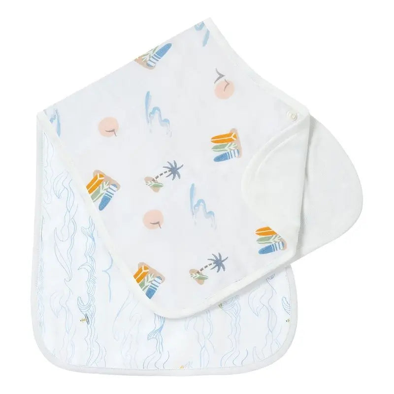 Nest Designs Burp'N Bib (2 Pack) white infant bibs with pastel beach motifs, two bibs laid flat.