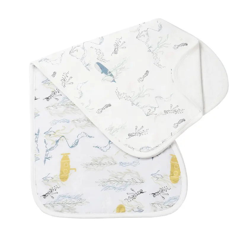 Nest Designs Burp'N Bib 2-Pack: white burp cloths with pale botanical print; shown folded and laid flat.