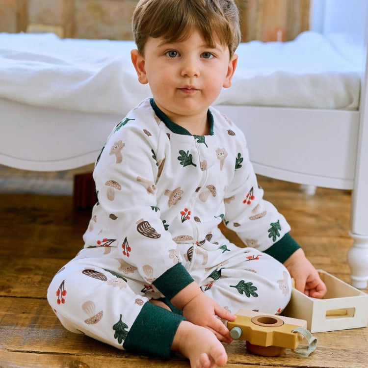 Nest Designs cotton long-sleeve footed sleep bag, 1.0 tog, forest forage pattern; white with woodland print and green cuffs