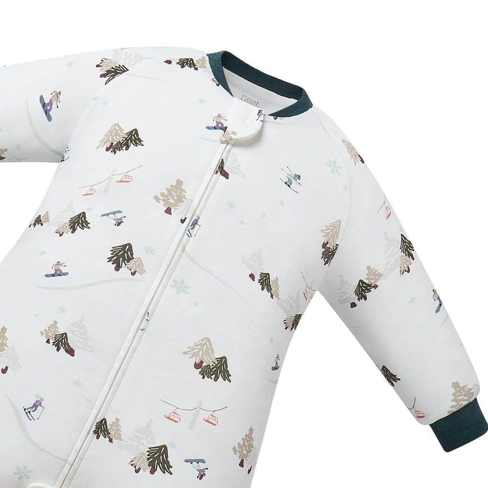 Nest Designs Cotton Long Sleeve Footed Sleep Bag 1.0 Tog Chills N' Thrills in white, with a visible front zipper.