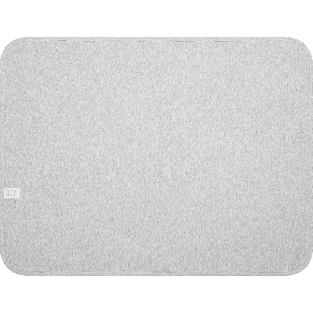 Nest Designs Dragon Dance change pad; light gray cotton, waterproof diapering mat