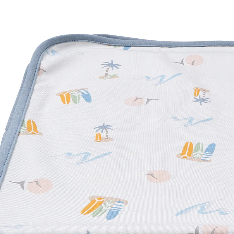 Nest Designs cotton waterproof change pad Surf Camp with blue edging and pastel surf print