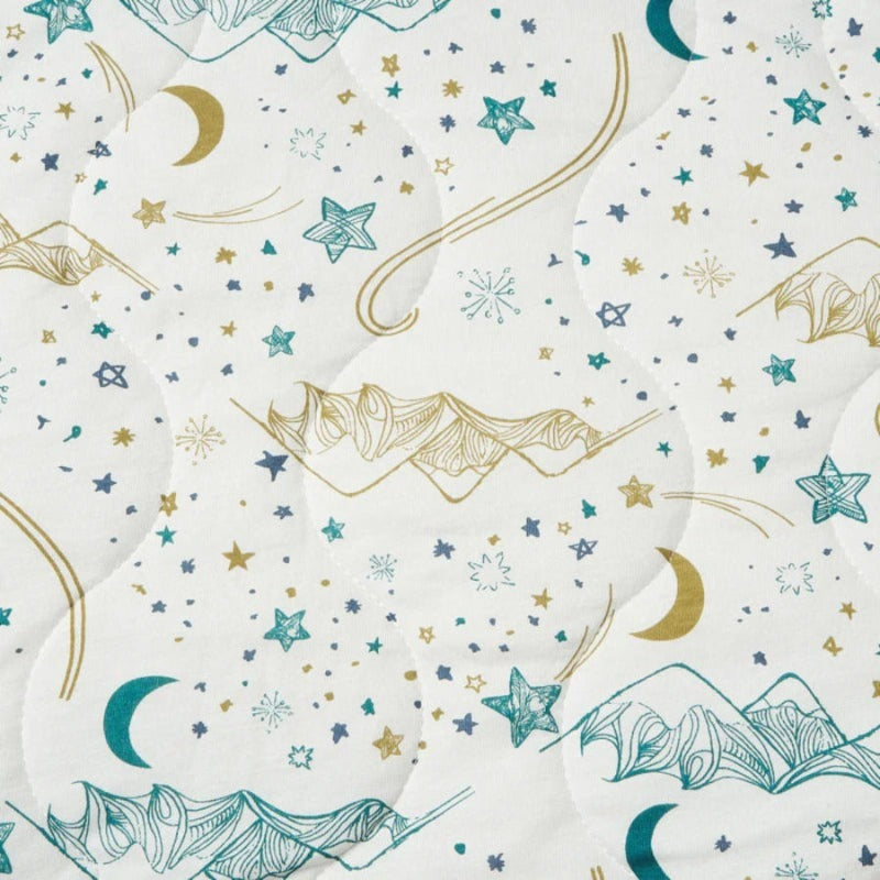 Nest Designs Cozy Blanket Small Stars White; soft baby blanket with teal and gold stars and moons, laid flat for cozy wrap.