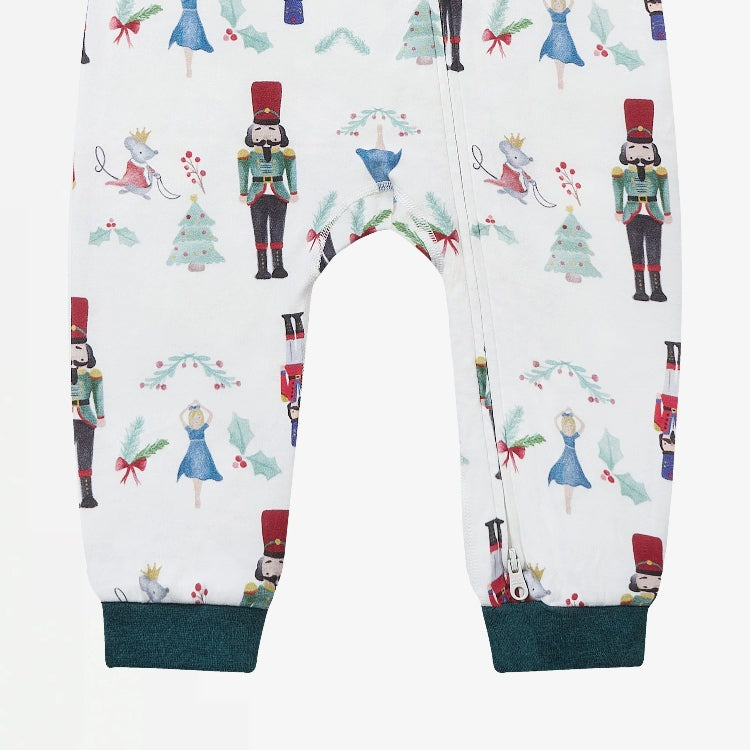 Nest Designs Organic Cotton Long Sleeve Footless Sleeper Nutcracker, white with green cuffs, side-zip for easy changes.