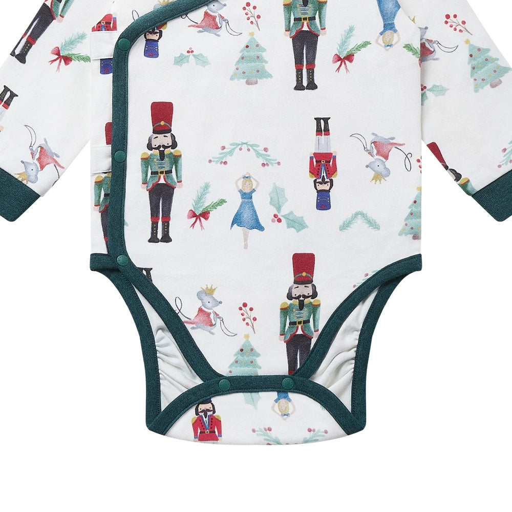 Nest Designs Organic Cotton Long Sleeve Kimono Onesie Nutcracker, white with nutcracker print and dark green trim, bottom snaps closed