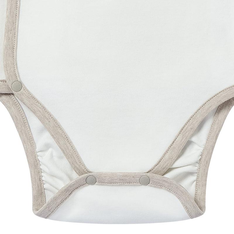 Nest Designs Organic Cotton Long Sleeve Kimono Onesie Safawhee in white with beige trim, snap closures.