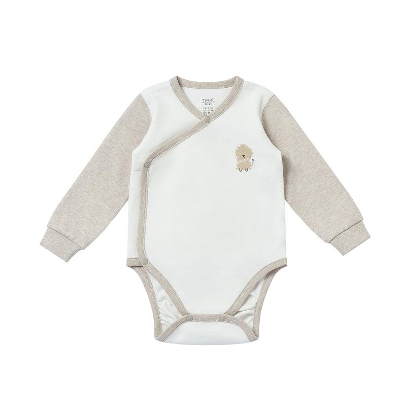 Nest Designs Safawhee organic cotton long-sleeve kimono onesie with beige sleeves and wrap-style front snaps.