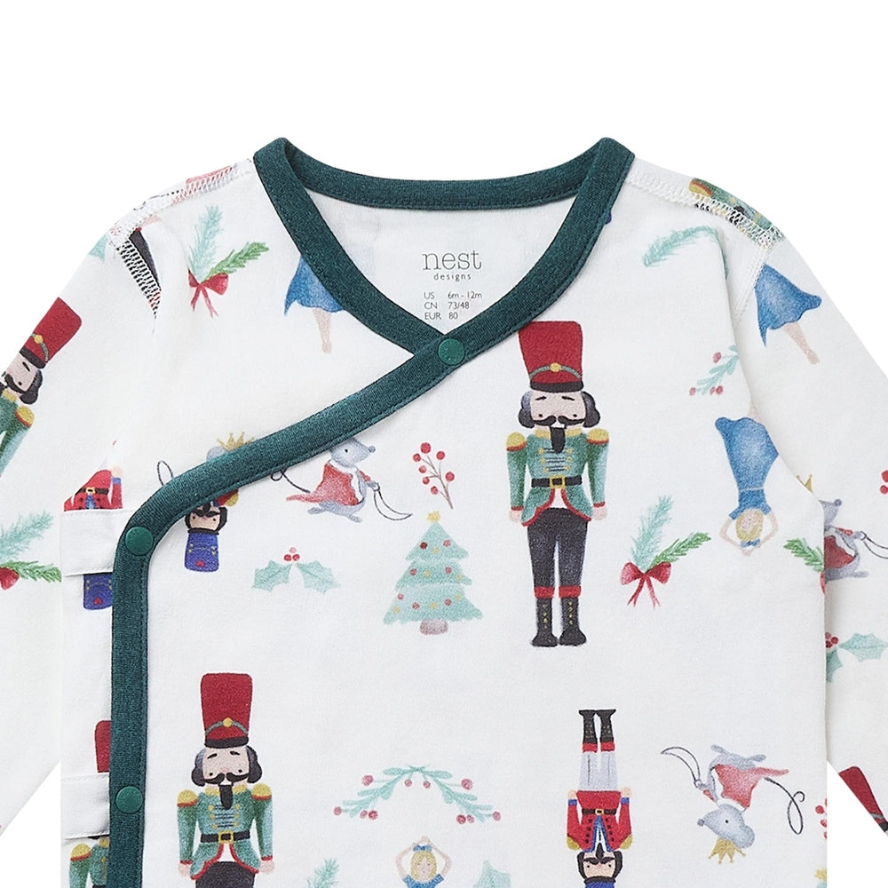 Nest Designs Organic Cotton Long Sleeve Kimono Onesie Nutcracker, white with teal trim and festive prints