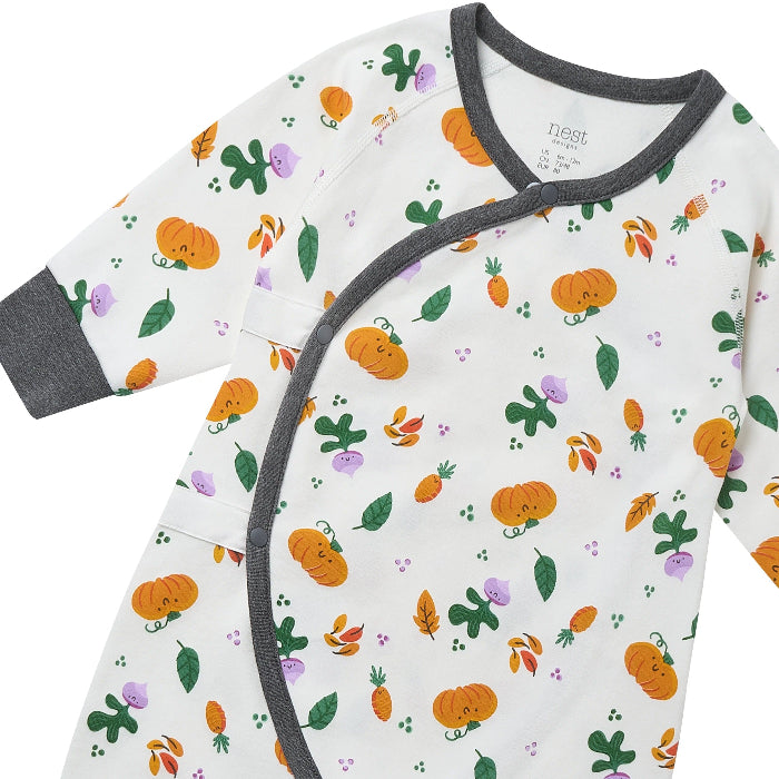 Nest Designs organic cotton baby kimono romper, white with orange pumpkins, green leaves, and gray trim