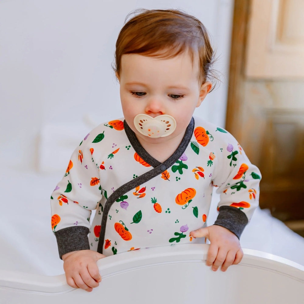 Nest Designs Organic Cotton long-sleeve kimono romper in white with orange carrot prints for babies