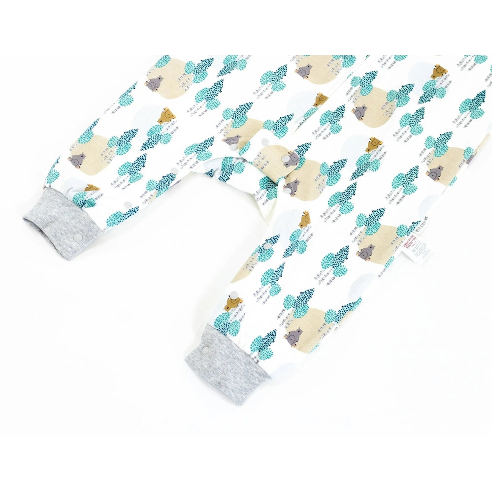 Nest Designs Organic Cotton Long Sleeve Sleep Suit 1.0 Tog Where's The Bear laid flat, teal trees with beige bears and grey cuffs.