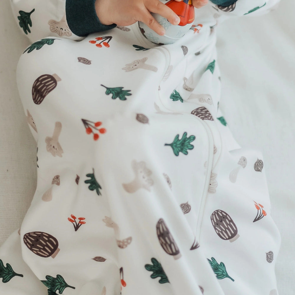 Nest Designs organic cotton sleep bag Forest Forage print in green and brown for baby