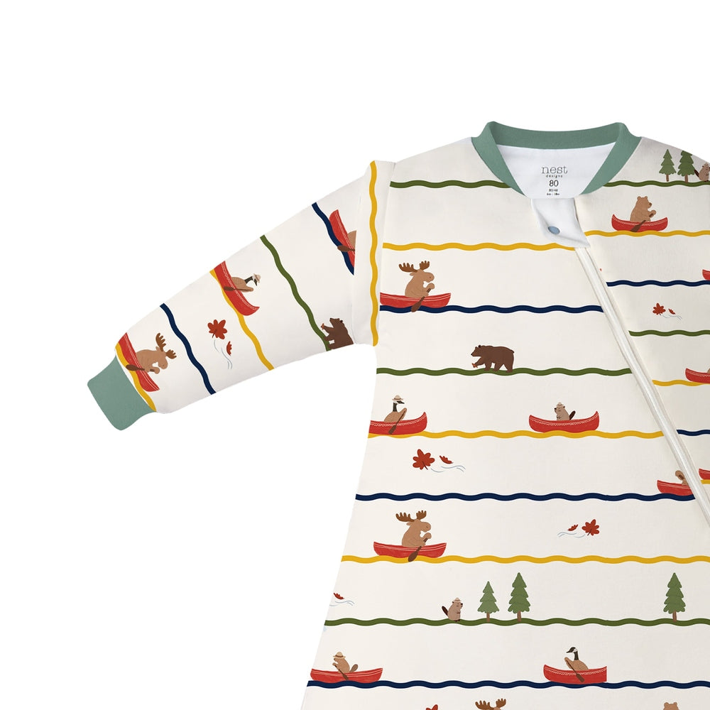 Nest Designs Organic Cotton Removable Sleeve Sleep Bag 1.0 Tog for 6M-18M in cream with boats, bears, trees; visible front zip.