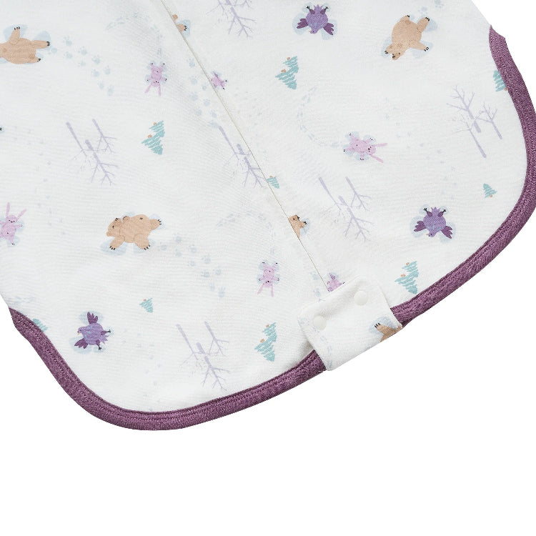 Nest Designs Organic Cotton Swaddle Sleep Bag 0.5 Tog Snow Angels, white with purple trim, newborn swaddling shown.