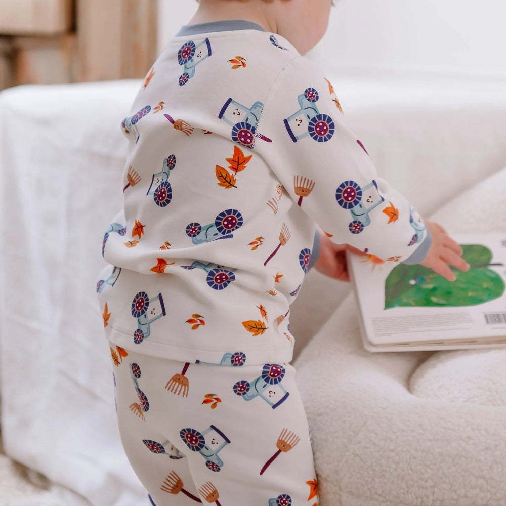 Nest Designs organic cotton two-piece long-sleeve pajama set with farm prints (blue tractors) for toddlers