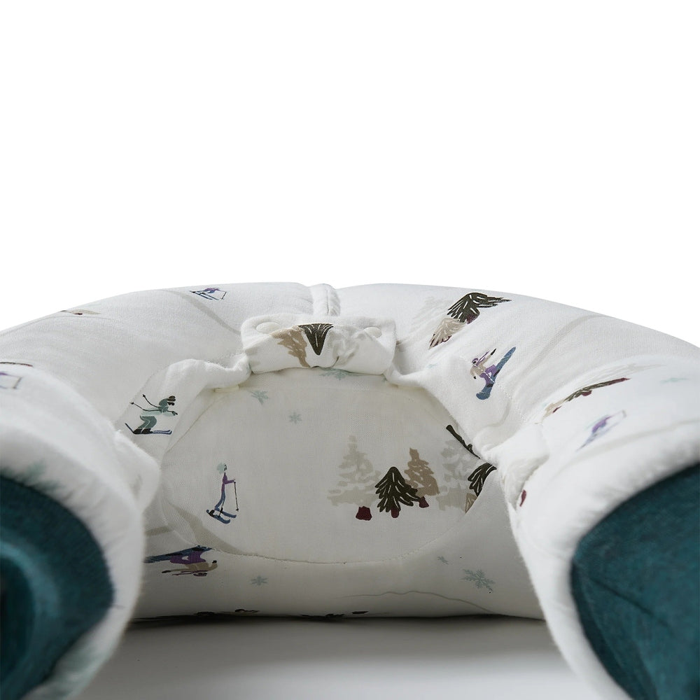 Nest Designs Raglan Bamboo Long Sleeve Footed Sleep Bag 2.5 Tog, white with teal cuffs and winter print.