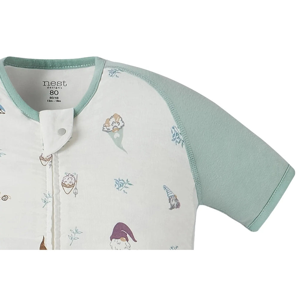 Nest Designs Raglan Bamboo Pima Short Sleeve Footed Sleep Bag 0.6 Tog with mint sleeves and gnome print, front zipper