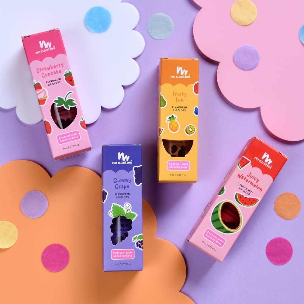 No Nasties Kids lip gloss set; four fruity flavored gloss boxes in pink, purple, orange, and red packaging.