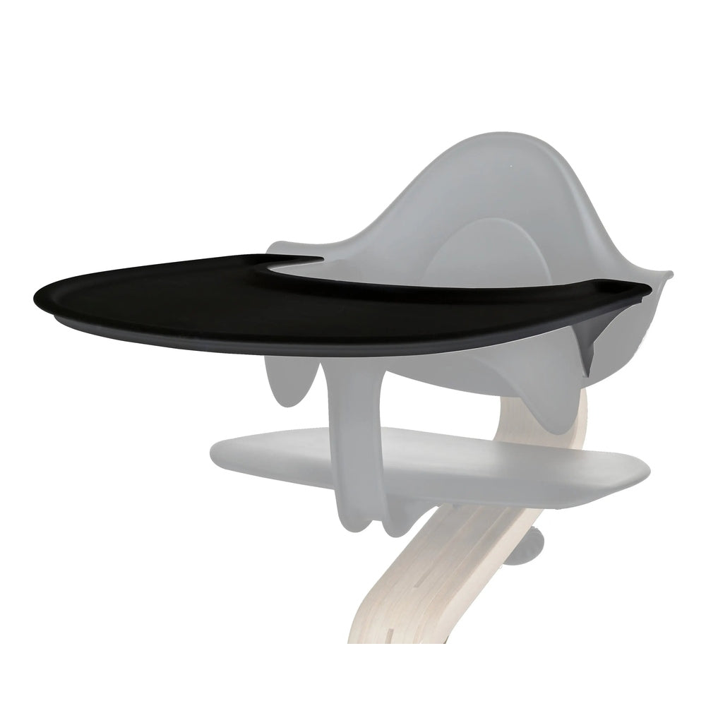 Nomi Tray by Evomove on a NOMI high chair; black tray clipped to a light wood frame.