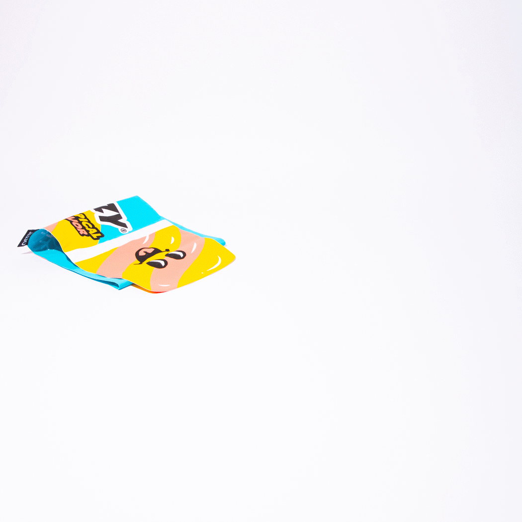 OMY Freezy Giant inflatable pillow in bright blue, yellow, pink with a cartoon face for party decor.