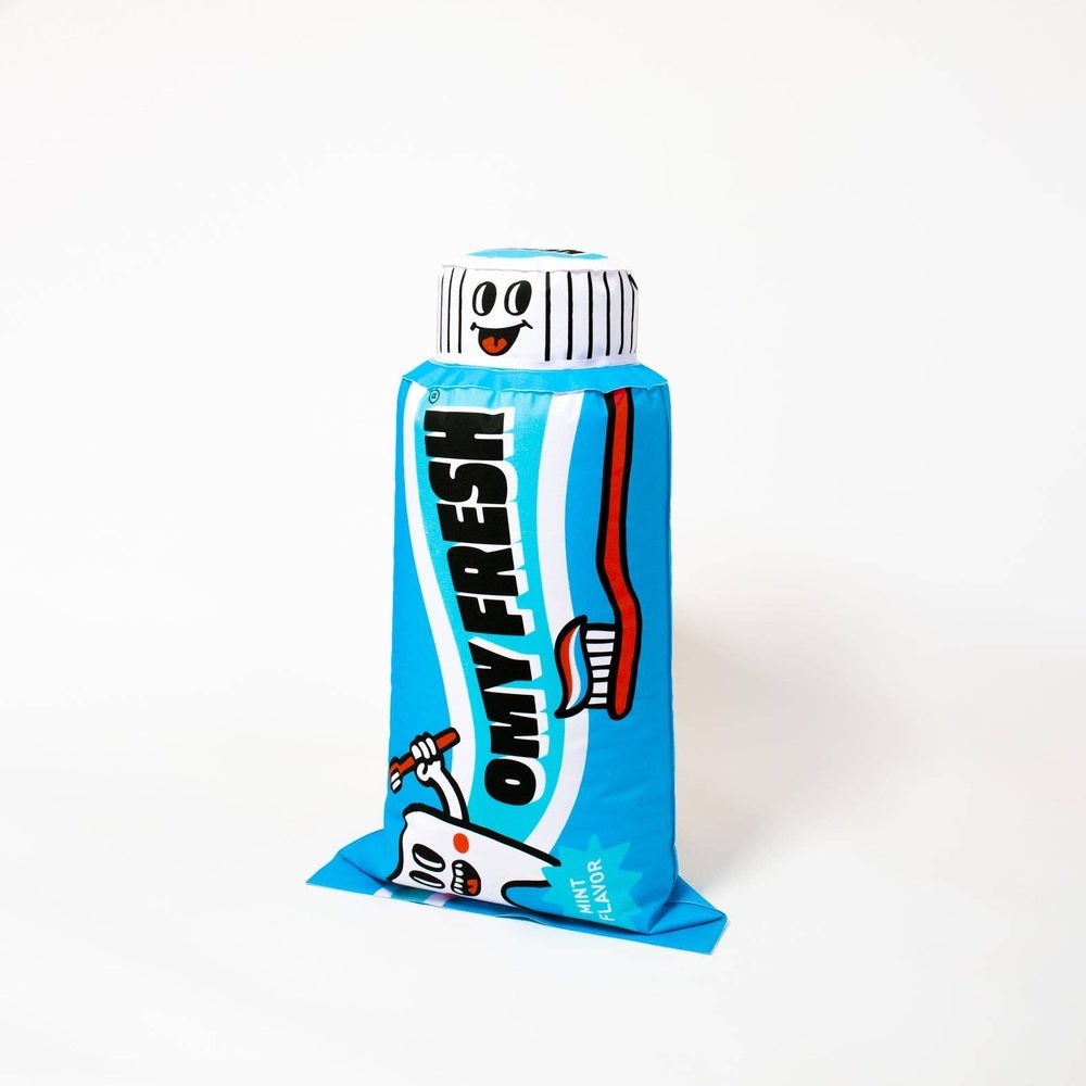 OMY Fresh Giant Inflatable Pillow in bright blue stands upright with a smiling cap, mint flavor branding.
