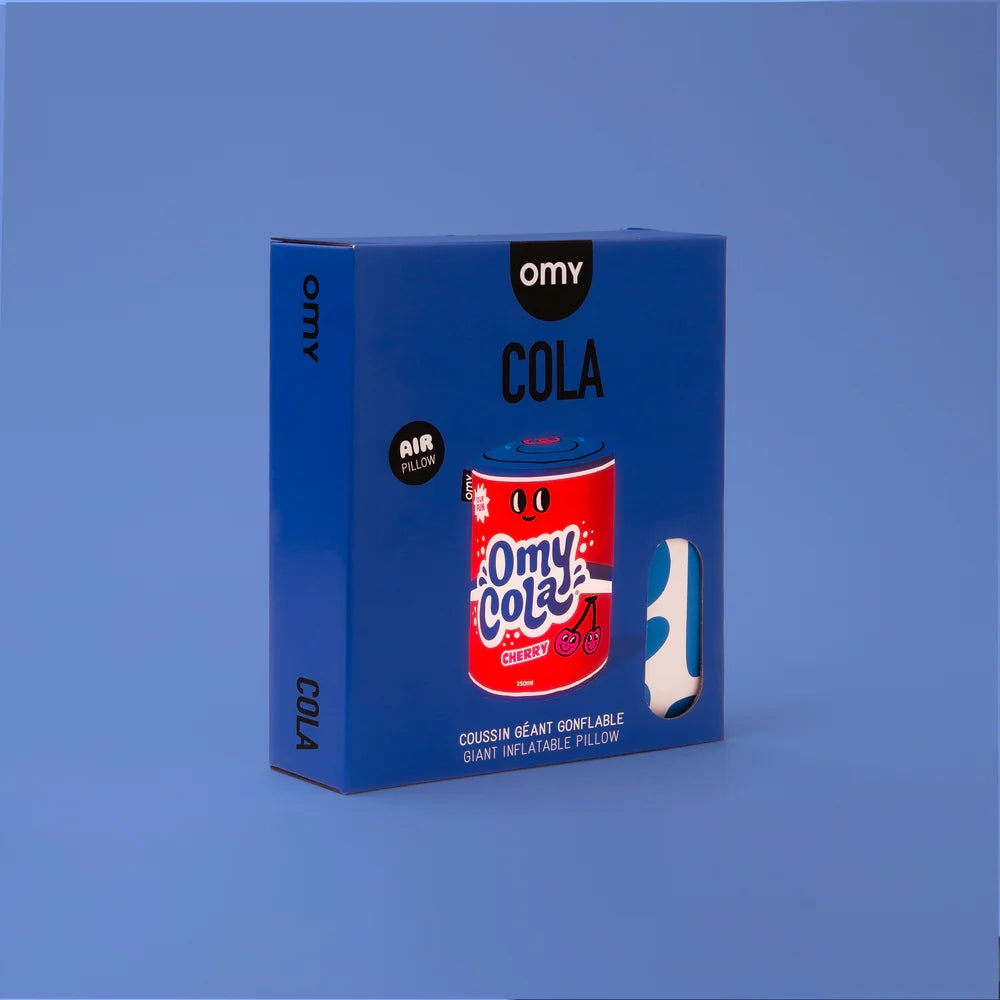 OMY Cola Giant inflatable pillow packaging box shows a red can design against a blue background.
