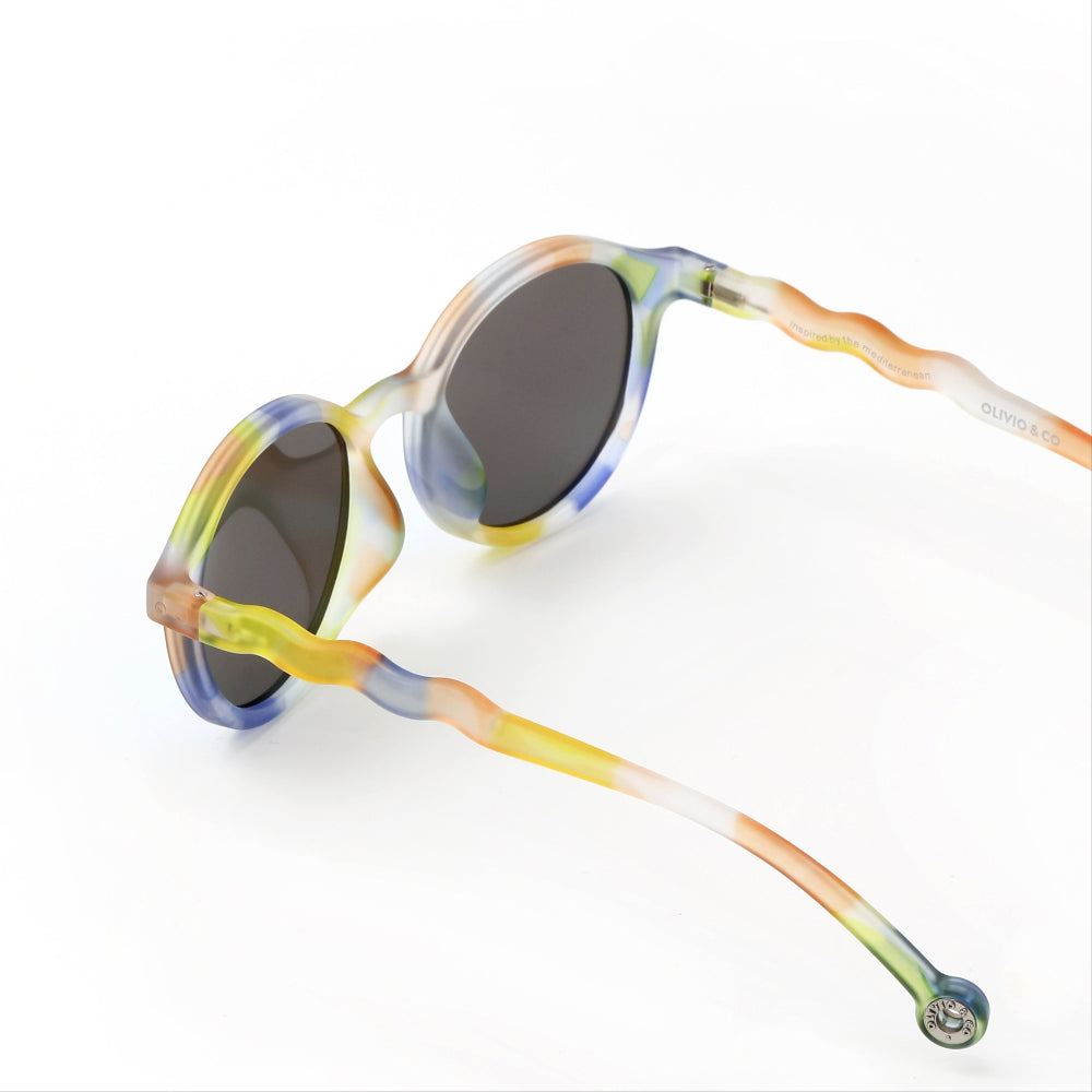 Olivio & Co oval sunglasses with multicolor art-brush frame and dark lenses