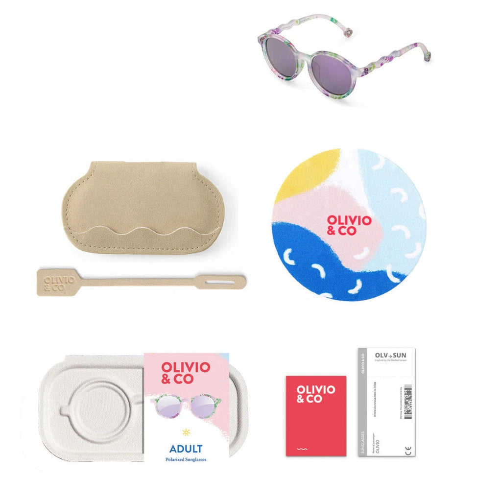 OLIVIO & CO oval sunglasses with floral frame and purple lenses; includes beige case, cleaning tool, and cloth