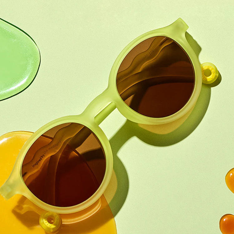 Olivio & Co junior oval sunglasses with lime-green frames and brown lenses