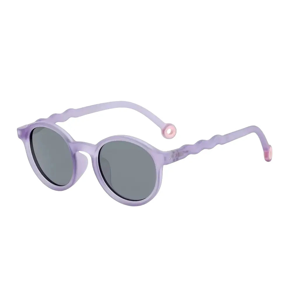 Olivio & Co Junior Oval Sunglasses in shell purple with gray lenses, kid-sized flexible arms.