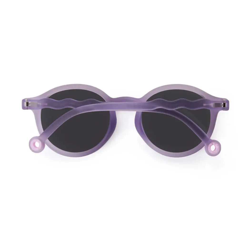 Olivio & Co Oval Sunglasses Junior+ Classic in purple shell frame with dark lenses for kids.