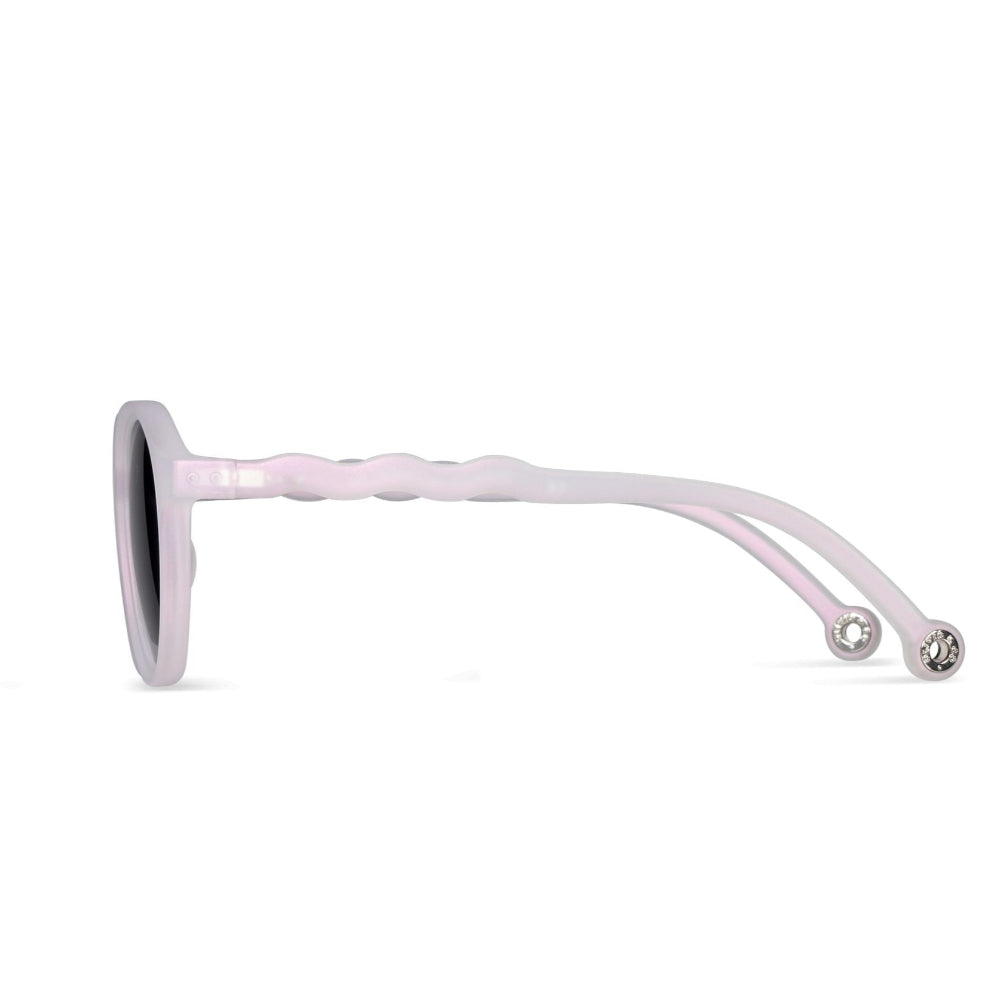 Olivio & Co Oval Sunglasses Adult Classic in shimmering pink, side profile shows wavy arms and crystal-end tips