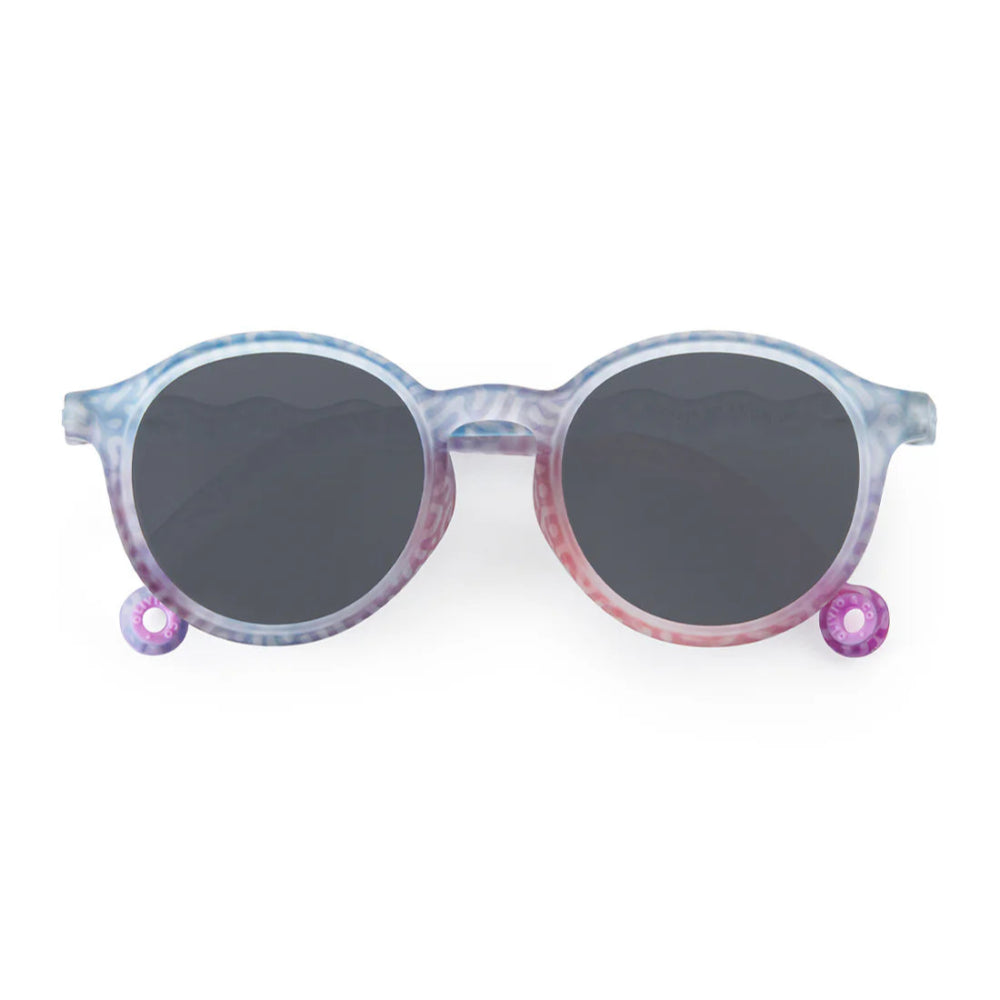 Olivio & Co Oval Sunglasses Junior+ Coral Reef Coral Fantasy; pastel tie-dye frame, dark lenses, displayed on white background.
