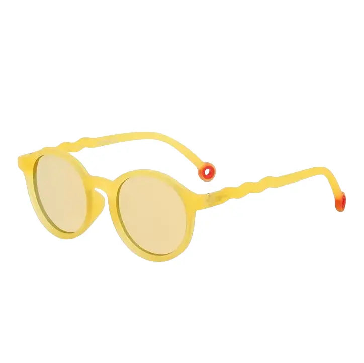 OLIVIO & CO Oval Sunglasses Kids Van Gogh Yellow with yellow tinted lenses and plastic frame.